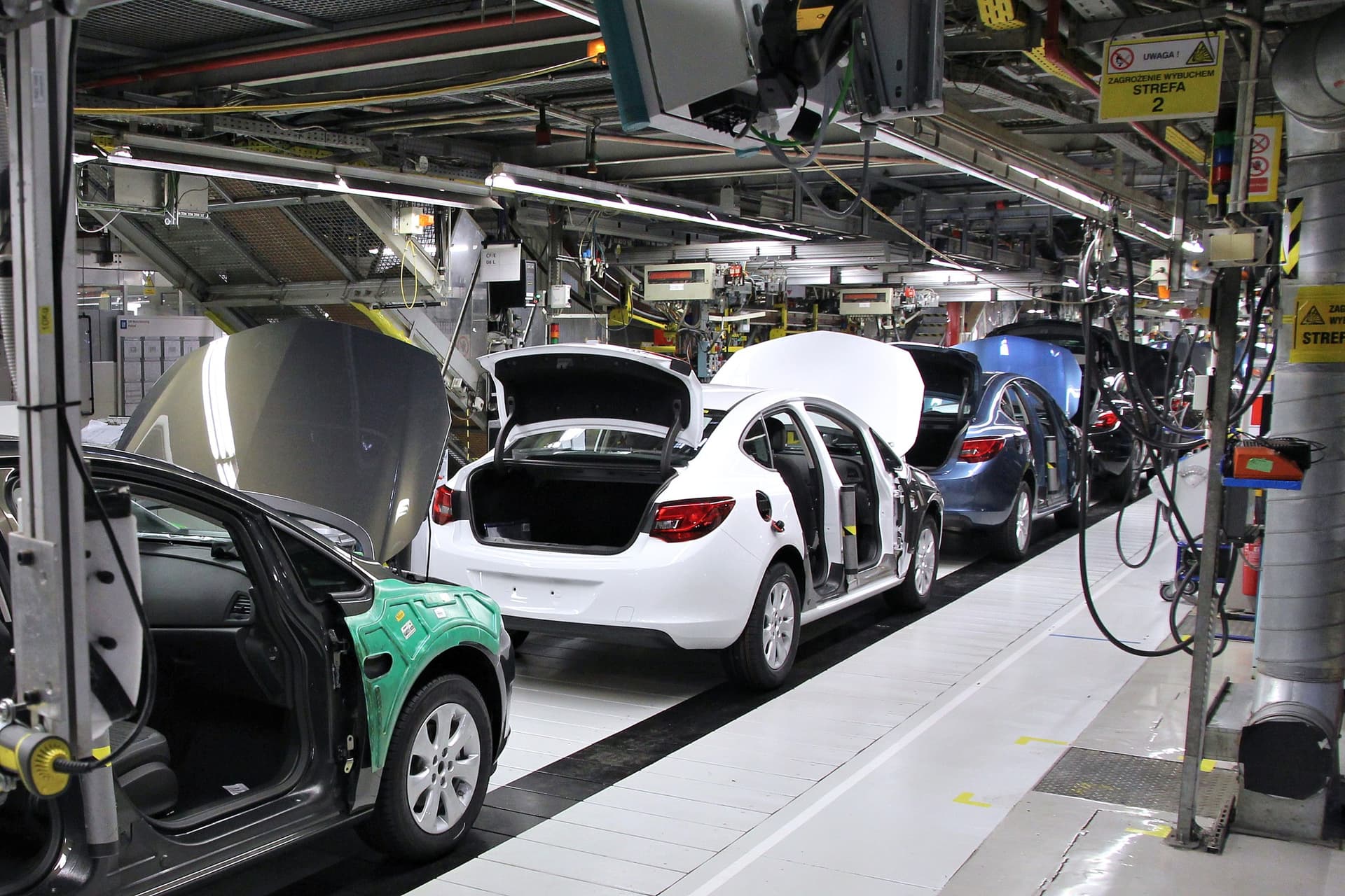 Automotive manufacturing — IoT-connected production line illustrating data compliance in action