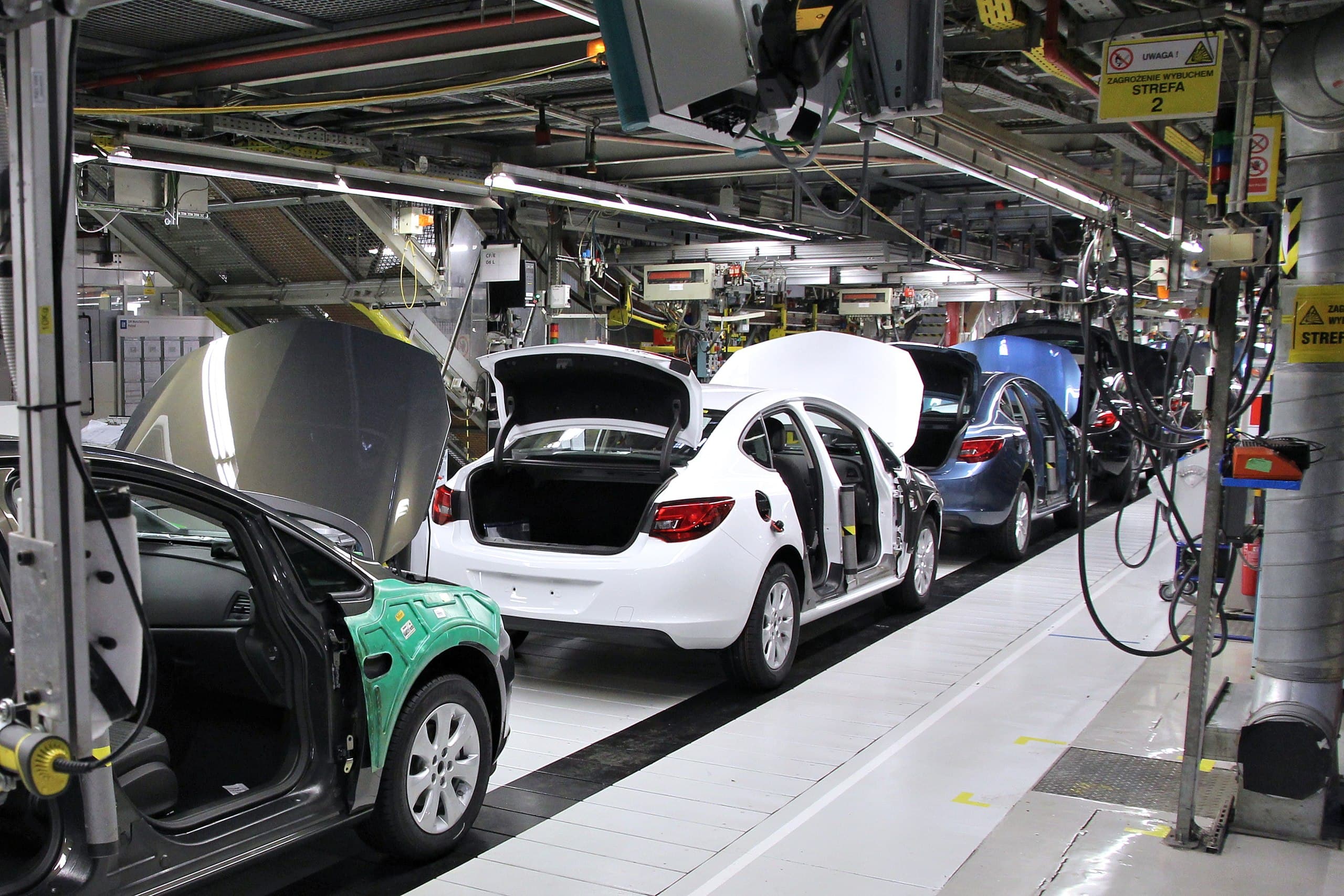 Automotive manufacturing — IoT-connected production line illustrating data compliance in action